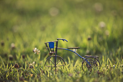 Close-up of bicycle on field