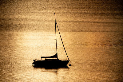 Sailboat on sea shore