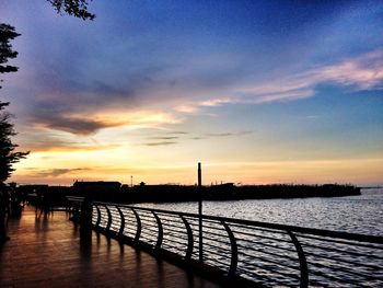 Scenic view of sea at sunset