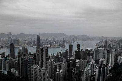 Aerial view of city and buildings against sky