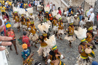 High angle view of people walking on street