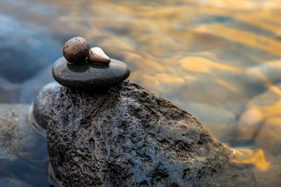 Close-up of stone stack on rock