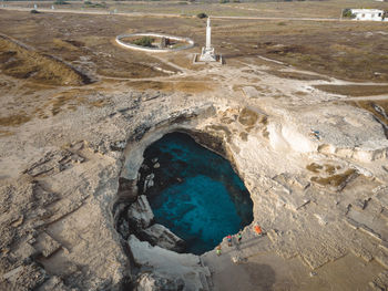 High angle view of hole on land
