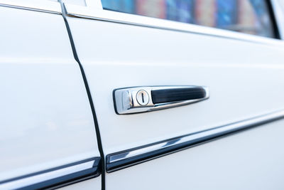 Car door handle of a white car