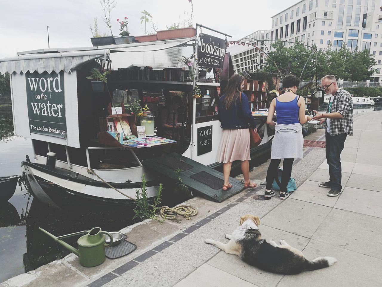 PANORAMIC VIEW OF PEOPLE AT MARKET