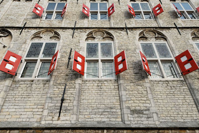 Low angle view of text on building