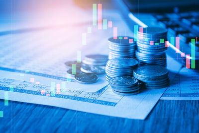 High angle view of coins on table