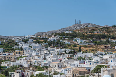 Townscape against clear blue sky