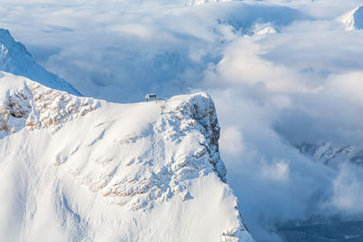 Scenic view of snowcapped mountains during winter