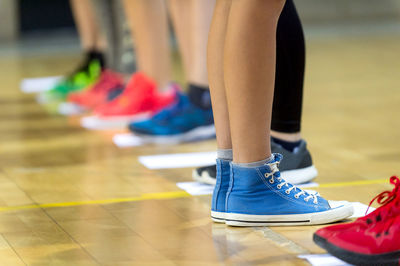 Low section of woman standing on floor
