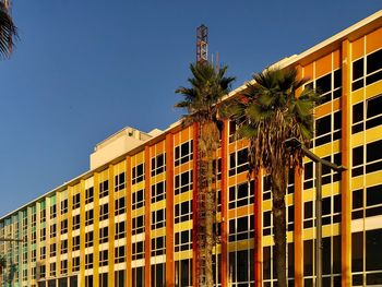 Low angle view of building against blue sky