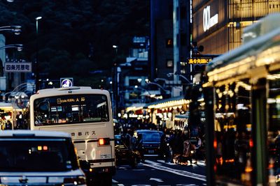 Cars on road in city at night