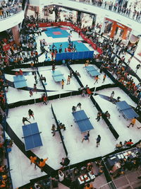 High angle view of people sitting in city