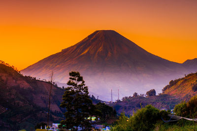 Scenic view of mountain against sky during sunset