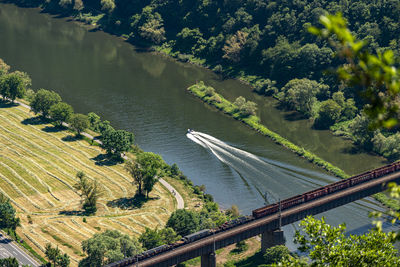 The steel truss structure of the railway bridge seen from above.