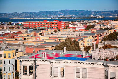 Colorful san francisco building tops with bay sunny day