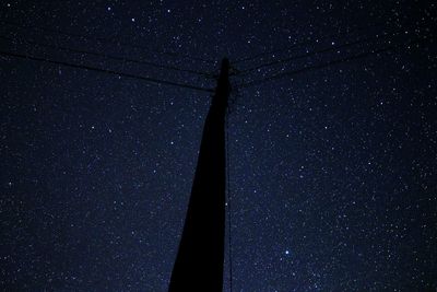 Low angle view of stars against sky at night