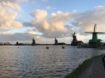 Traditional windmill against sky