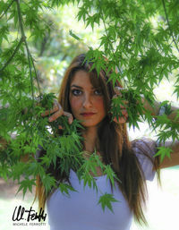 Portrait of young woman in park