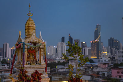 Spirit-house on a rooftop in bangkok