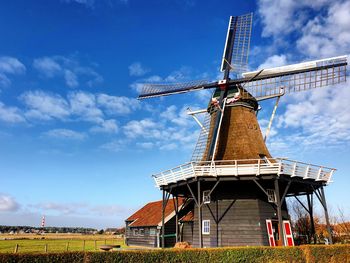 A traditional windmill on the island ameland. this windmill is being used to make local foods. 