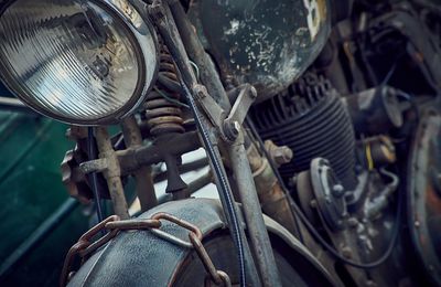 Close-up of abandoned motorcycle