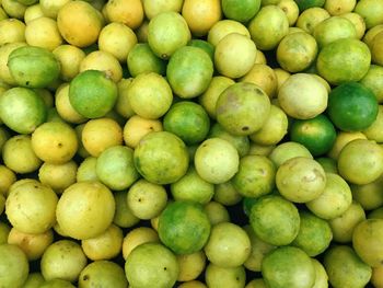 Full frame shot of oranges in market