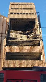 Low angle view of built structure against sky on sunny day