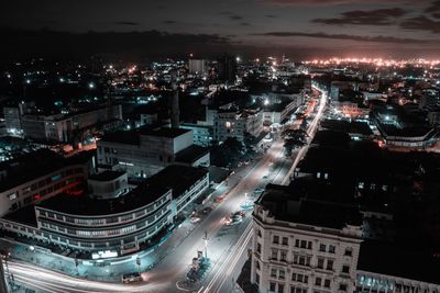 Aerial view of illuminated city at night