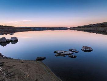 Scenic view of lake against clear sky