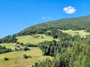 Scenic view of landscape against clear blue sky