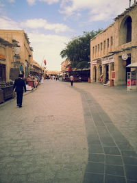 People walking on city street