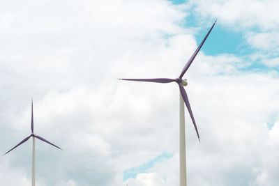 Low angle view of wind turbine against sky