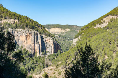 Scenic view of mountains against clear sky