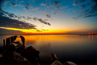 Scenic view of sea against sky during sunset