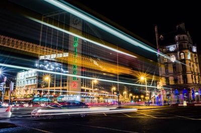 Light trails on city street at night