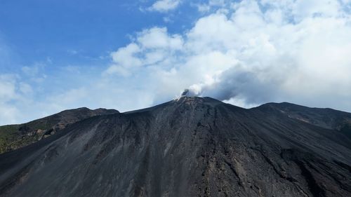 Panoramic view of volcanic landscape against sky