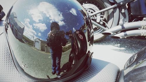 Reflection of man in water