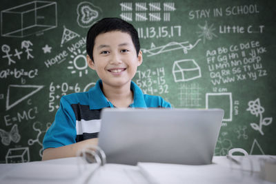 Boy studying at table