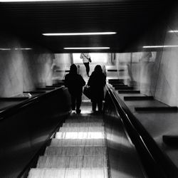 People on escalator