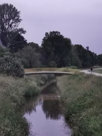 Bridge over lake against sky