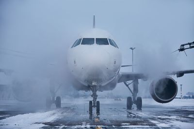 Airplane on runway during winter