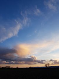 Scenic view of silhouette landscape against sky during sunset