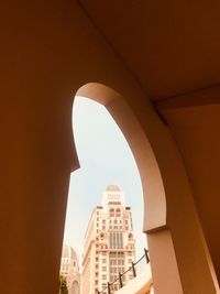 Low angle view of buildings against clear sky