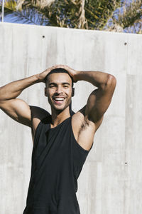 Portrait of african american male athlete smiling at camera