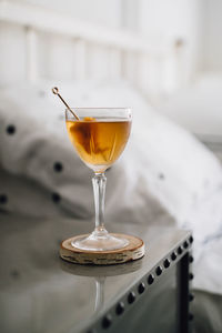 Martinez cocktail, a variation on a manhattan with barrel-aged gin and sweet vermouth
