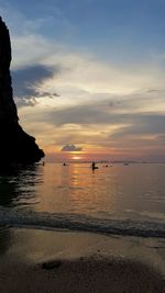 Scenic view of sea against sky at sunset