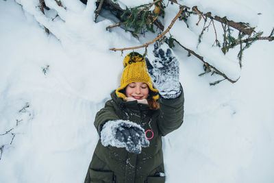 Beautiful girl in snow