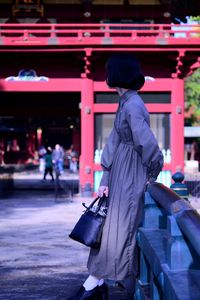 Woman with umbrella walking in city　japanese  sexygirl 