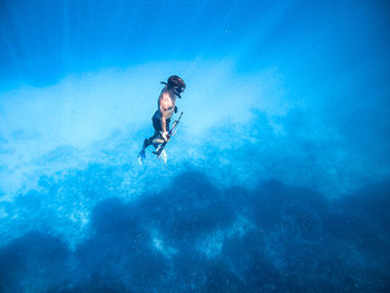 Man swimming in sea